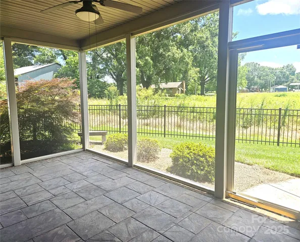 a view of a room with sliding glass door