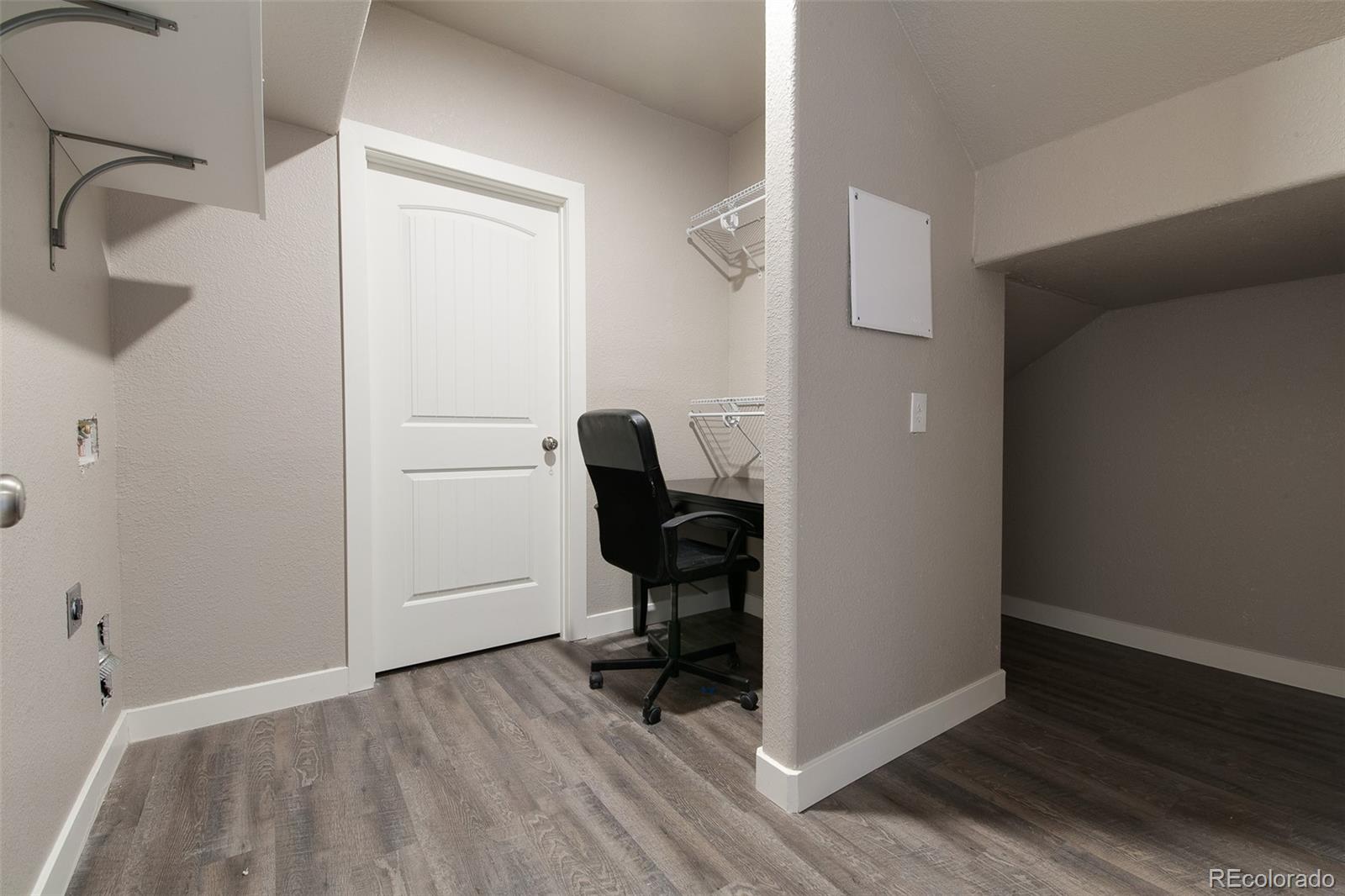 Undisclosed Address Castle Rock, CO 80104 - Photo 13 of 19 a view of workspace with wooden floor
