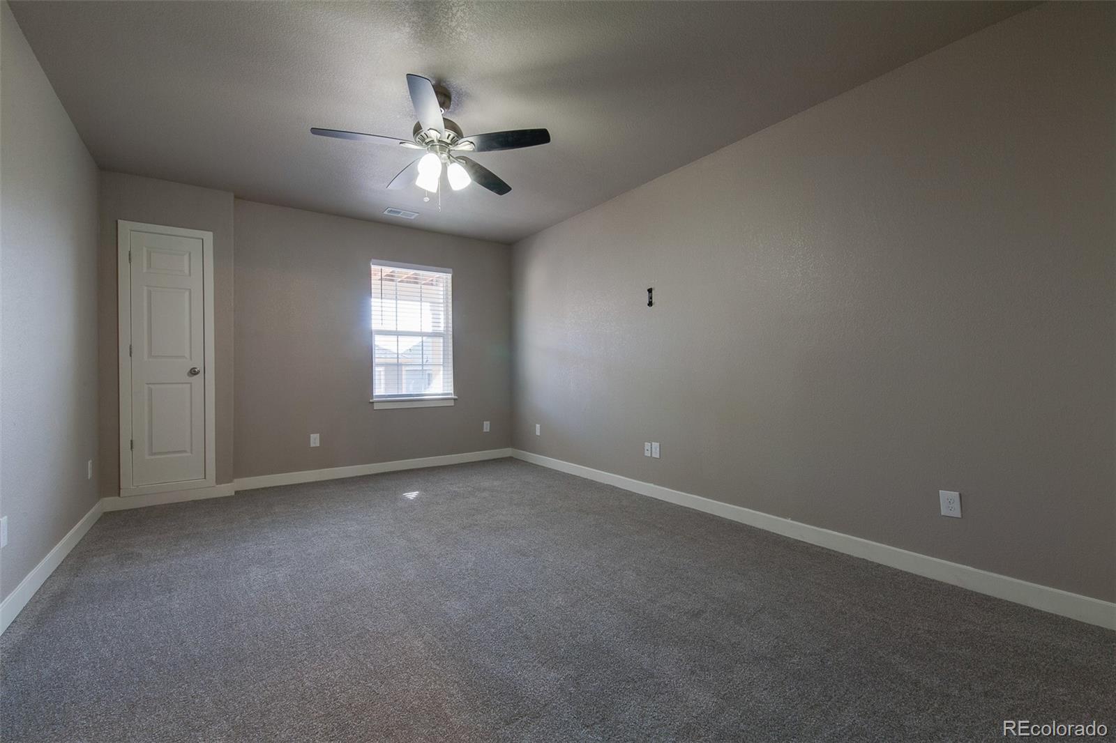 Undisclosed Address Castle Rock, CO 80104 - Photo 7 of 19 a view of an empty room with a window