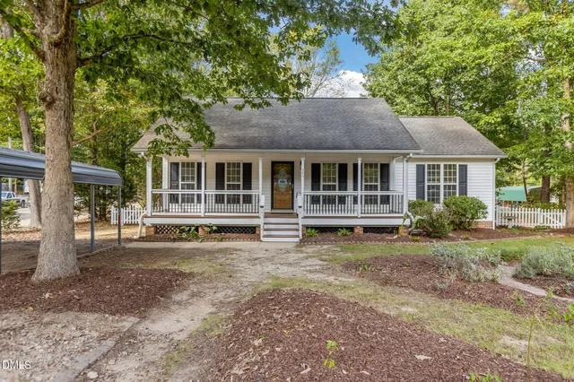 a house view with a garden space