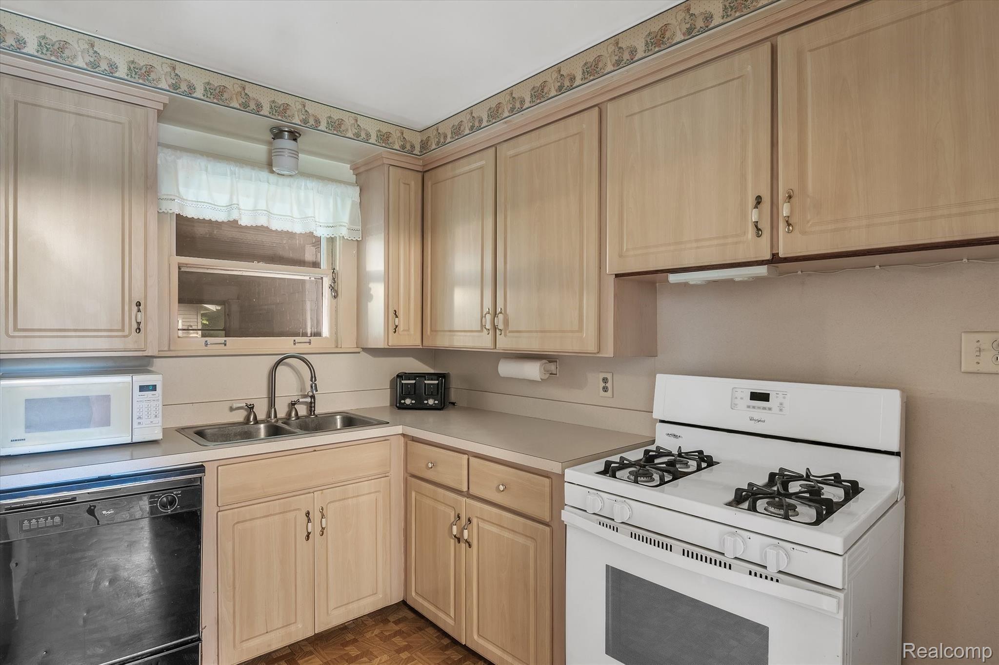 25010 Graham Road Redford, MI 48239 - Photo 10 of 27 Nicely appointed kitchen and appliances stay with the home