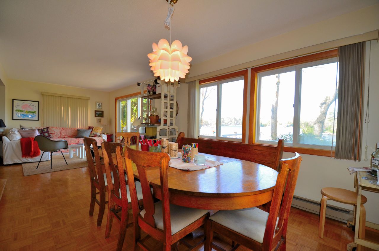 202 Kibbe Road Otis, MA 01029 - Photo 14 of 22 a view of a dining room with furniture window and outside view