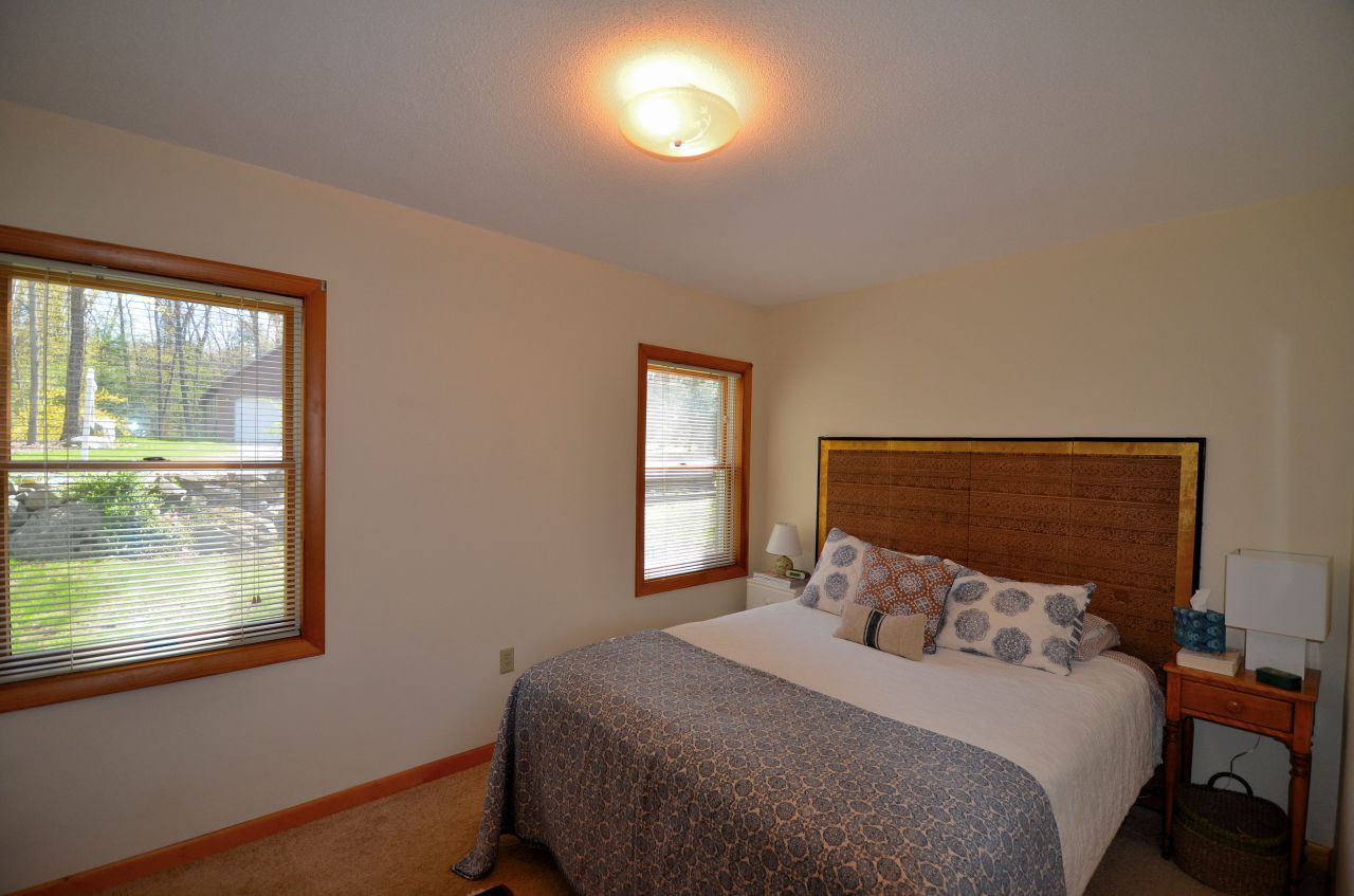 202 Kibbe Road Otis, MA 01029 - Photo 16 of 22 a bedroom with a bed and window