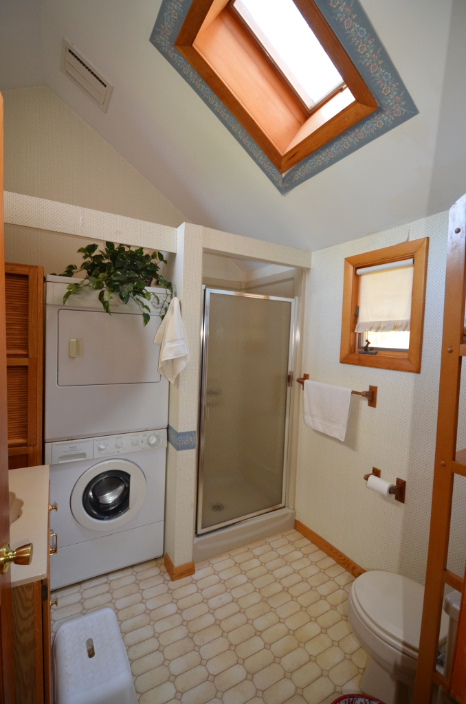 202 Kibbe Road Otis, MA 01029 - Photo 17 of 22 a bathroom with a sink a toilet and a shower