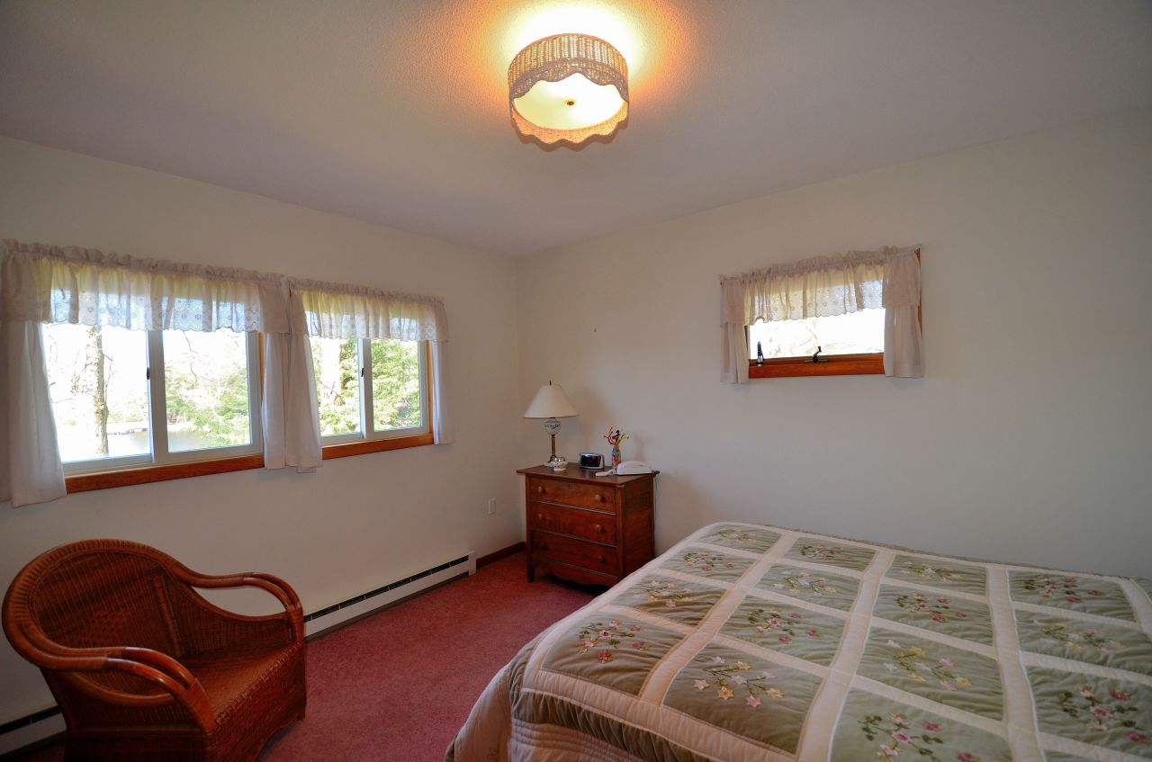 202 Kibbe Road Otis, MA 01029 - Photo 19 of 22 a bedroom with bed and window