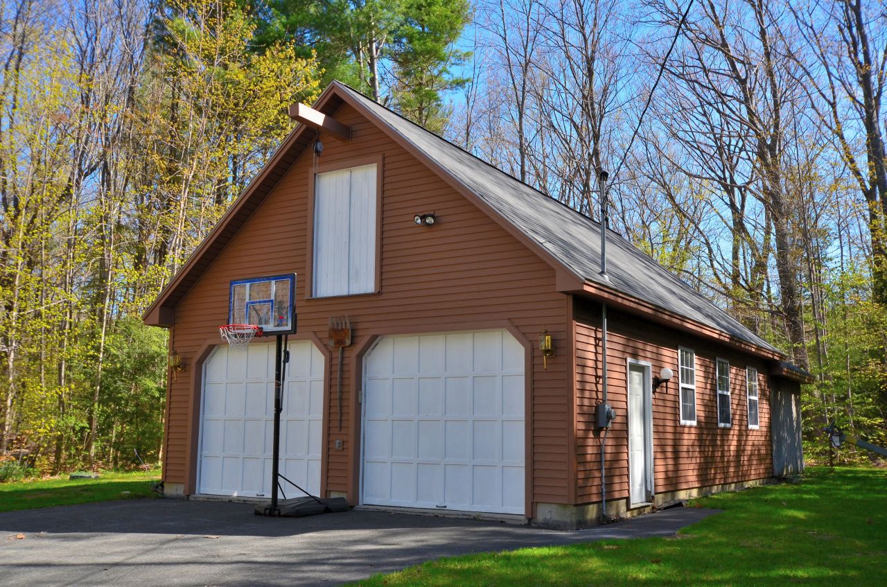 202 Kibbe Road Otis, MA 01029 - Photo 4 of 22 a front view of a house with garden