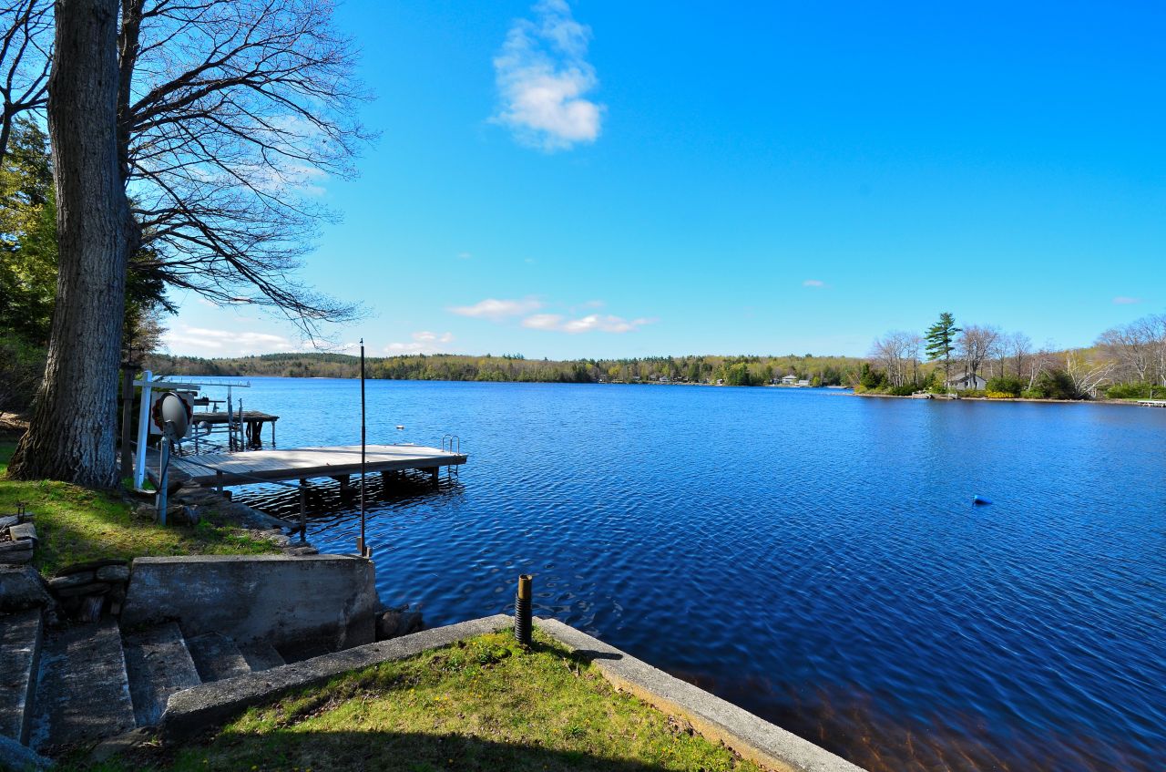 202 Kibbe Road Otis, MA 01029 - Photo 5 of 22 a view of a lake with a house