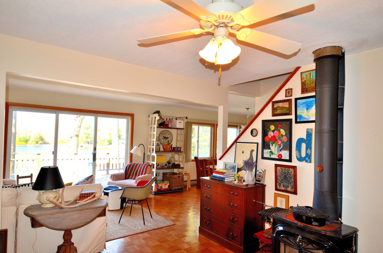 202 Kibbe Road Otis, MA 01029 - Photo 9 of 22 a living room with lots of furniture and a large window