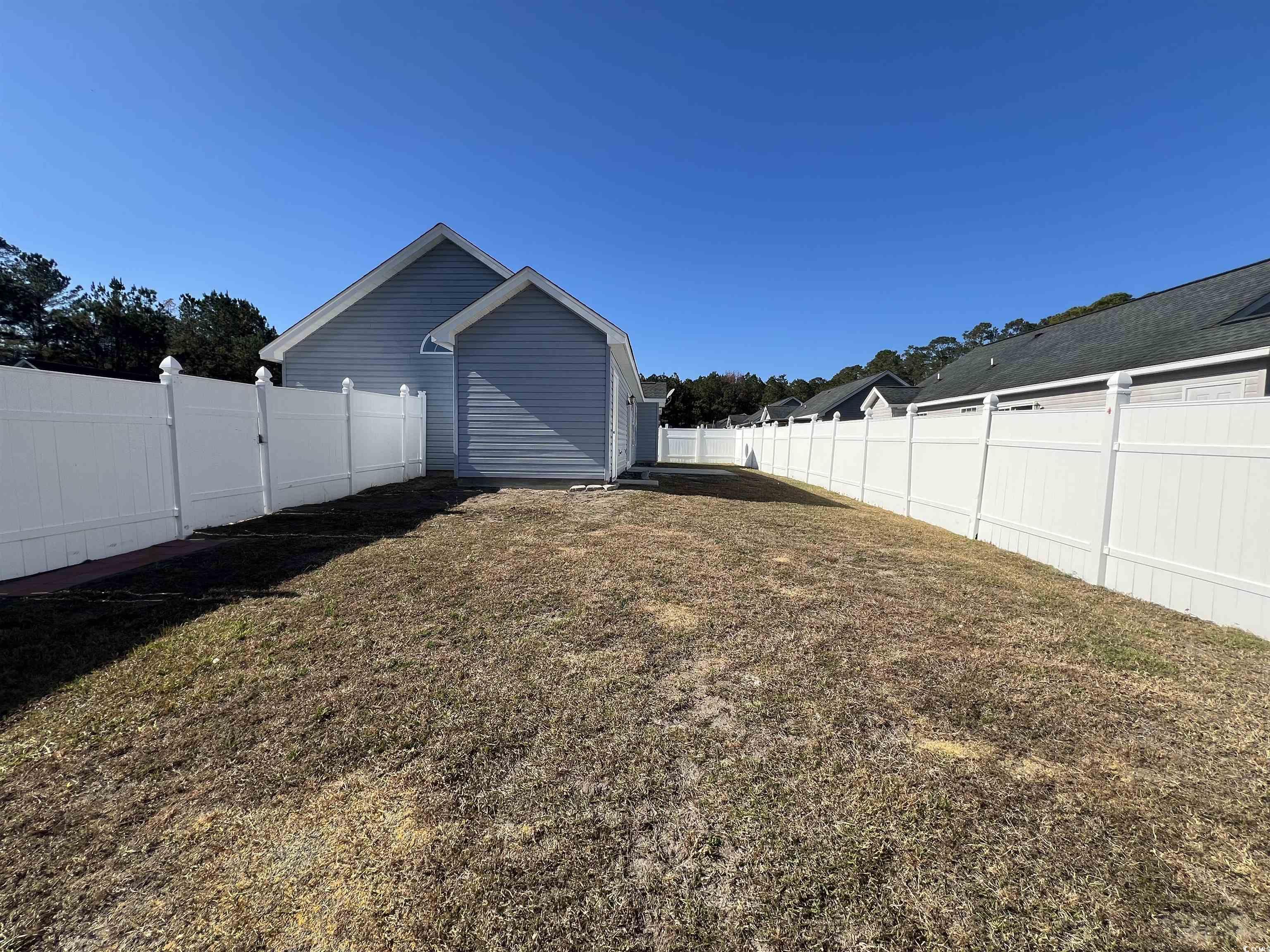 225 Upper Saddle Circle Conway, SC 29526 - Photo 19 of 24 View of fenced backyard