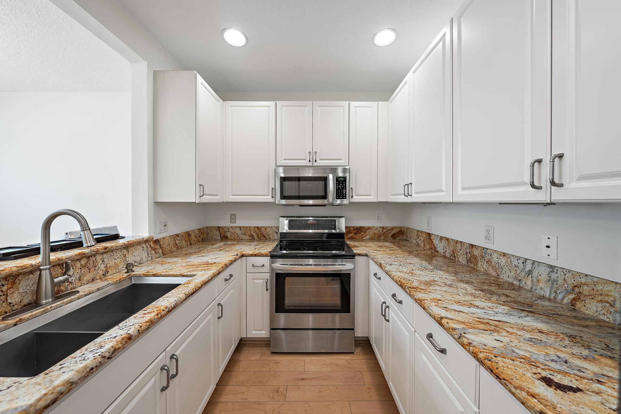 4316 Blowing Point Place Jupiter, FL 33458 - Photo 3 of 45 Kitchen