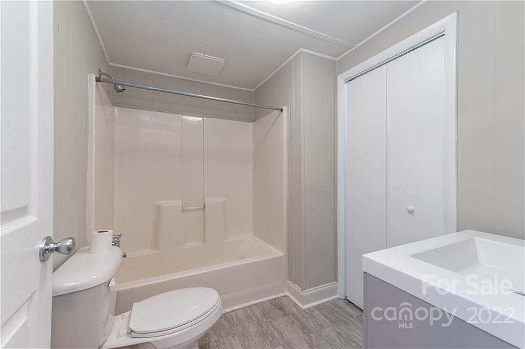 872 State Rd S-29-376 Lancaster, SC 29720 - Photo 8 of 15 a bathroom with a sink a toilet and shower