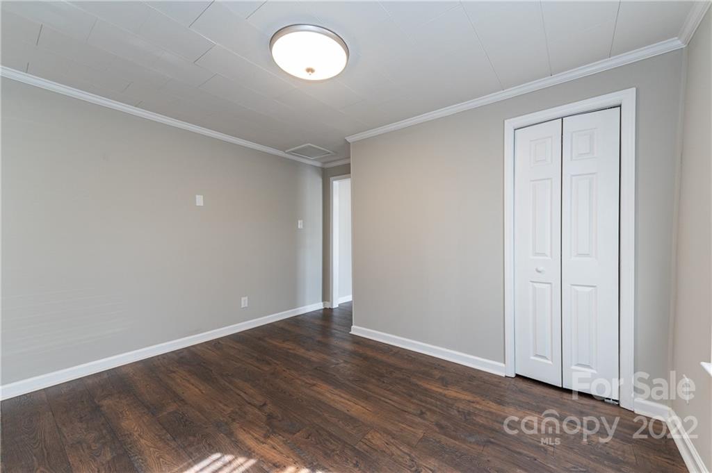 872 State Rd S-29-376 Lancaster, SC 29720 - Photo 10 of 15 a view of an empty room with wooden floor