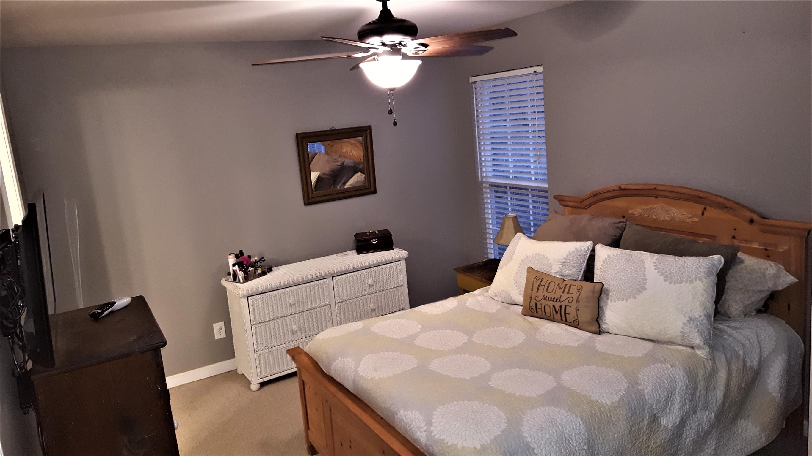 1036 White Road Burns, TN 37029 - Photo 6 of 10 Master bedroom w/ full bath and walk-in closet