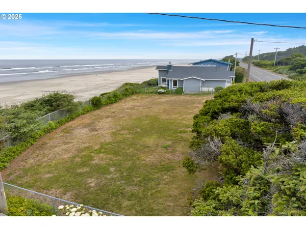 a view of a lake with a building in the background