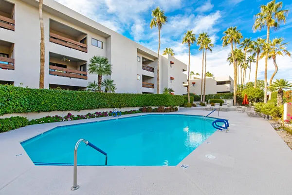 a swimming pool with yard