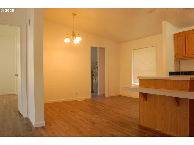 a picture of a bathroom with a sink and a window