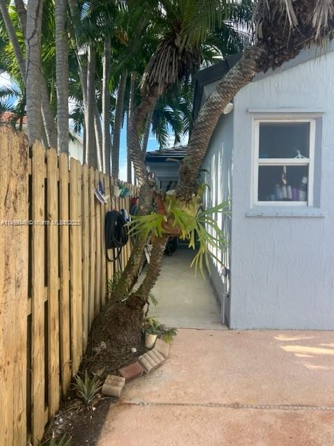 9435 Southwest 156th Place, Unit 9435 Miami, FL 33196 - Photo 22 of 28 a house view with a outdoor space