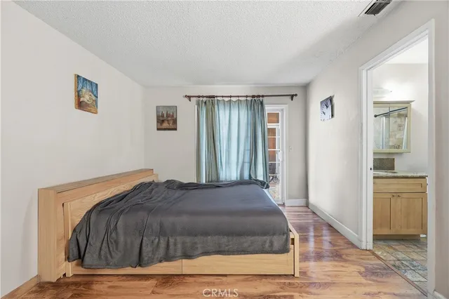 a view of a livingroom with furniture and a ceiling fan