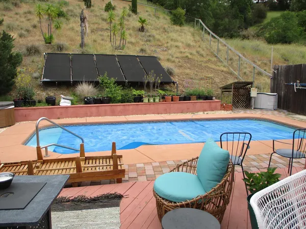 swimming pool with outdoor seating