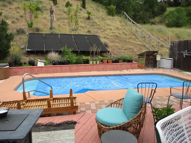 swimming pool with outdoor seating