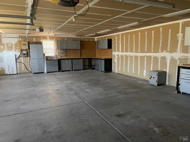 a view of an empty room with stairs