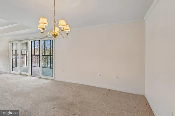 a view of a room with a chandelier
