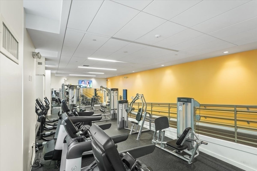 21 Father Francis Gilday Street, Unit 114 Boston, MA 02118 - Photo 20 of 28 a view of a room with gym equipment