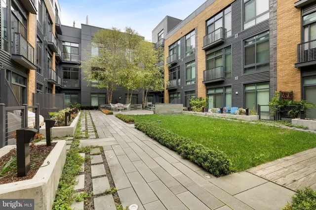 a outdoor space with patio furniture and a potted plant
