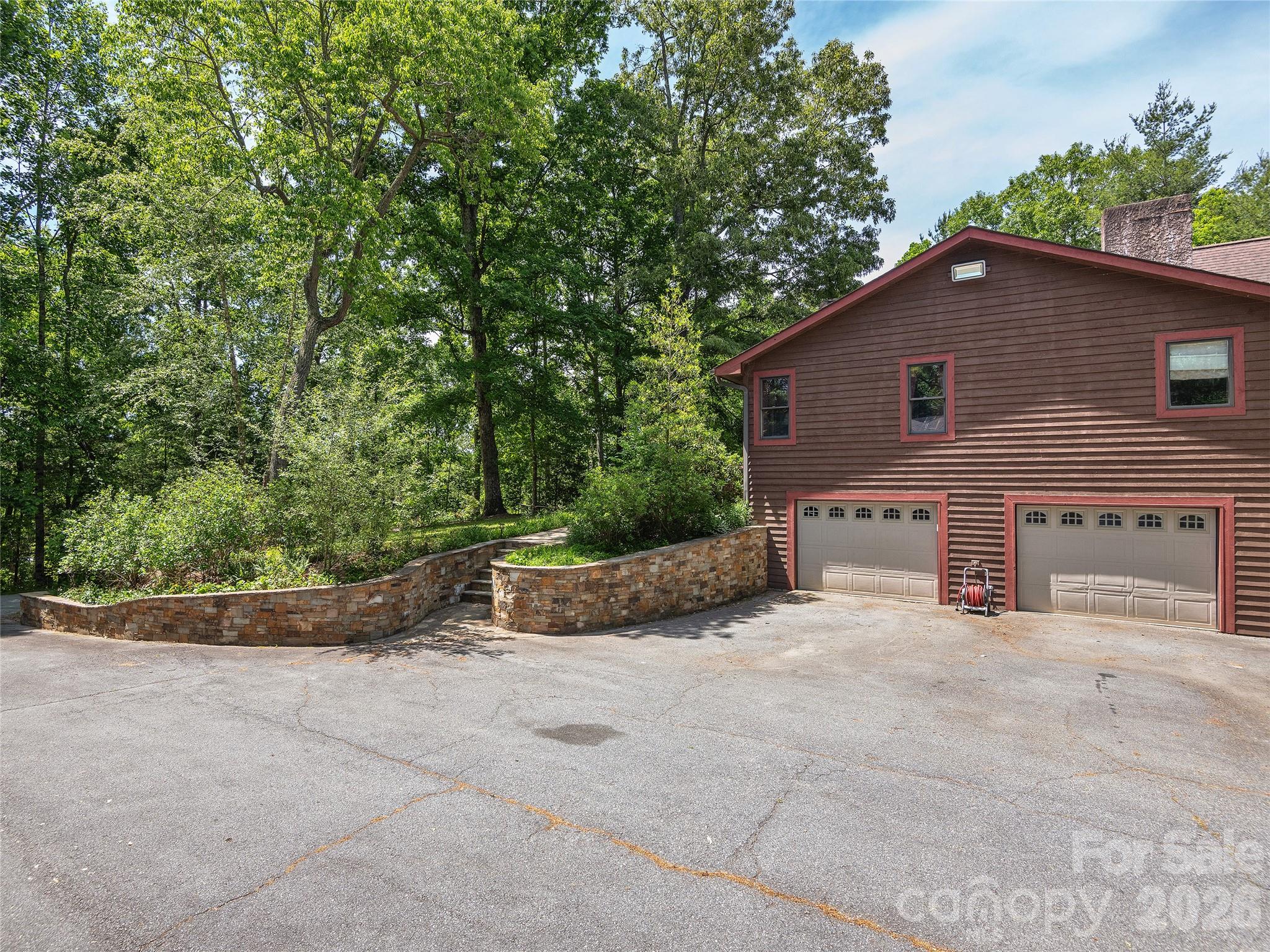 40 Deer Ridge Road Mills River, NC 28759 - Photo 34 of 35 a view of a house with a yard