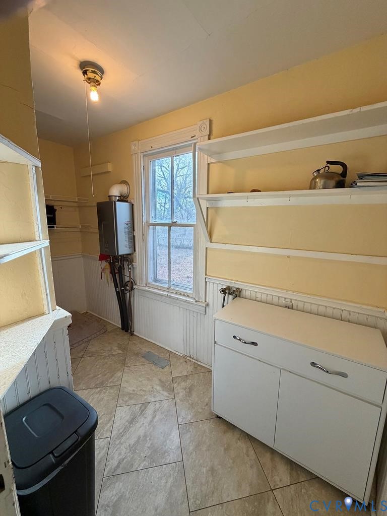 224 Courthouse Road Heathsville, VA 22473 - Photo 15 of 37 a view of storage and utility room with washer and dryer
