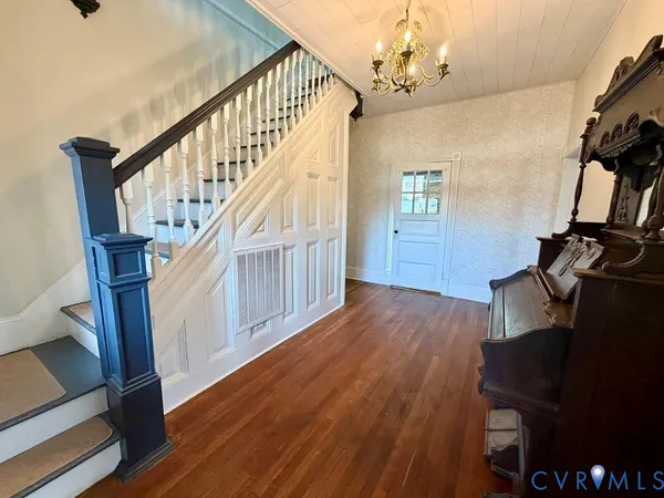 a view of entryway with wooden floor