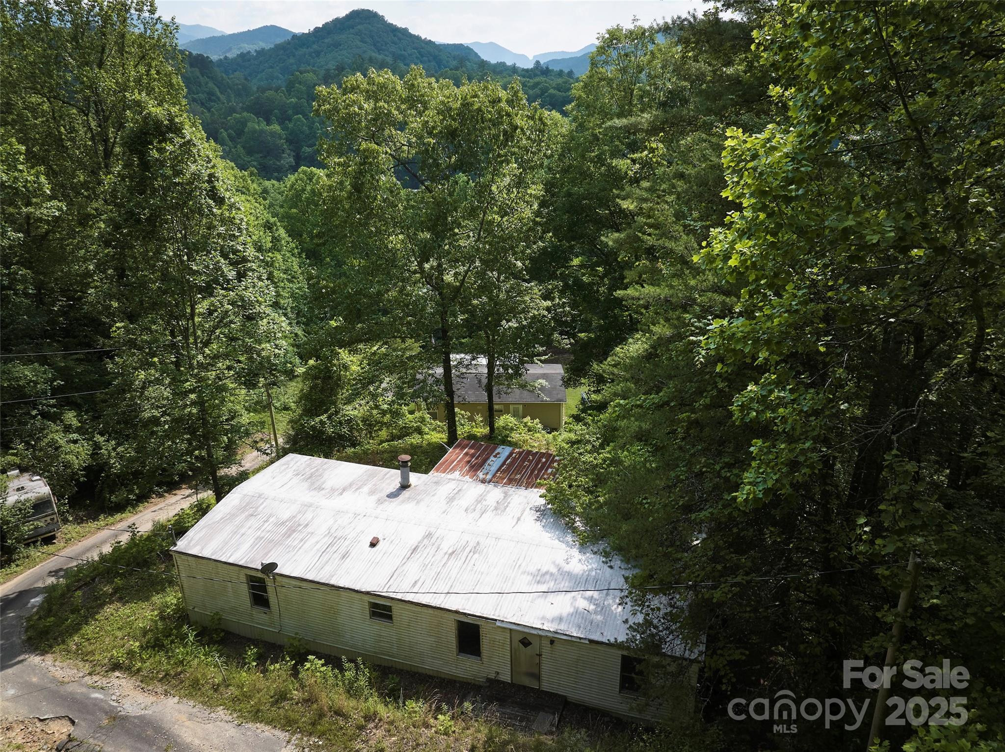 91 Keys Hill Road Almond, NC 28702 - Photo 15 of 19 an aerial view of a house with a yard