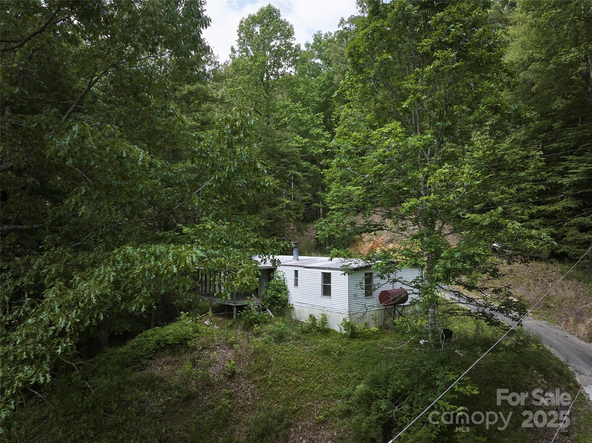 91 Keys Hill Road Almond, NC 28702 - Photo 2 of 19 a view of a yard