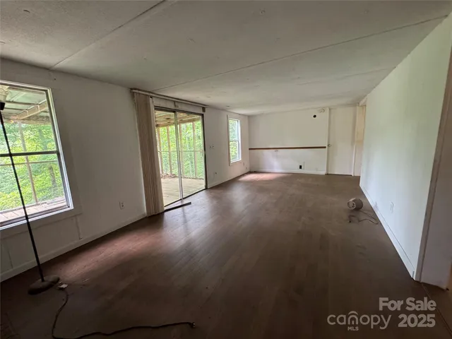 an empty room with windows