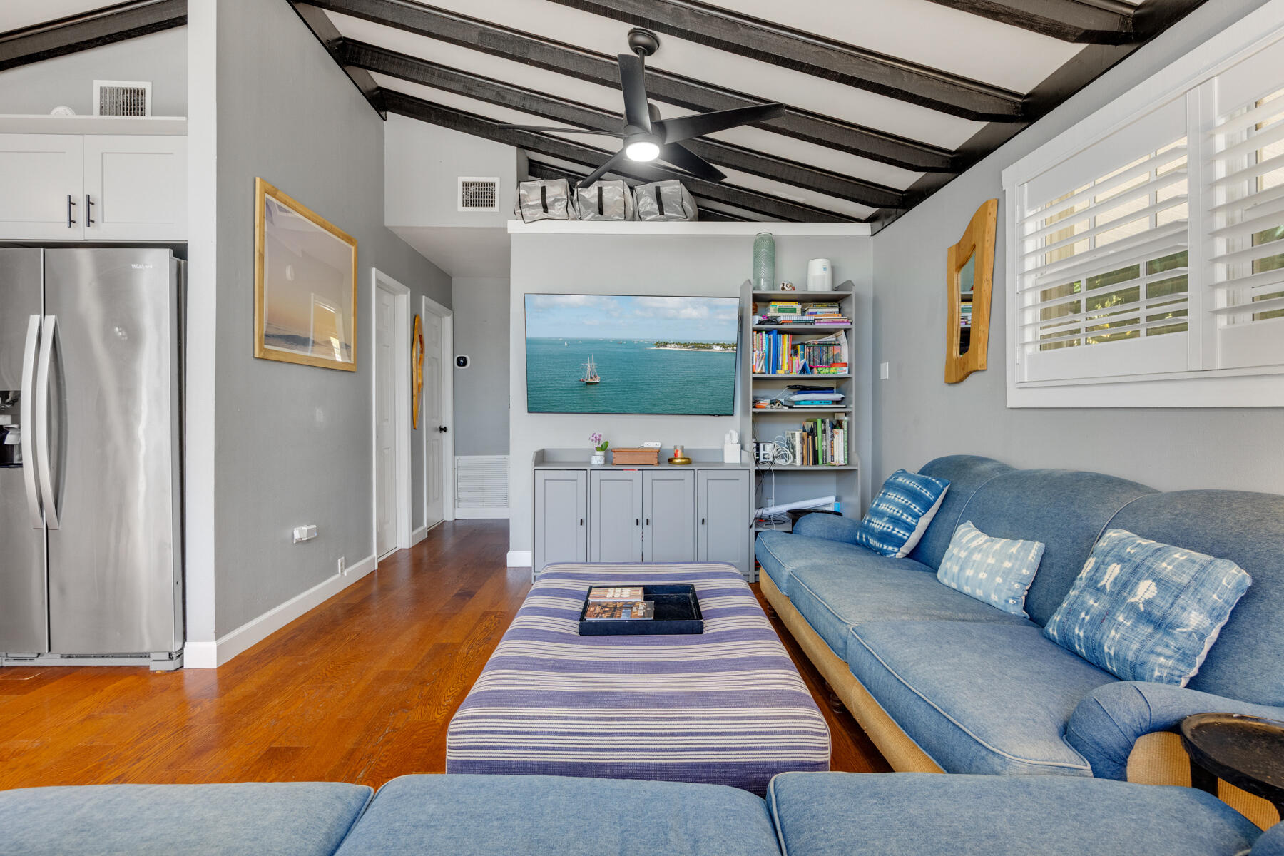 29961 Pine Channel Road Big Pine Key, FL 33043 - Photo 13 of 32 a living room with furniture and a flat screen tv