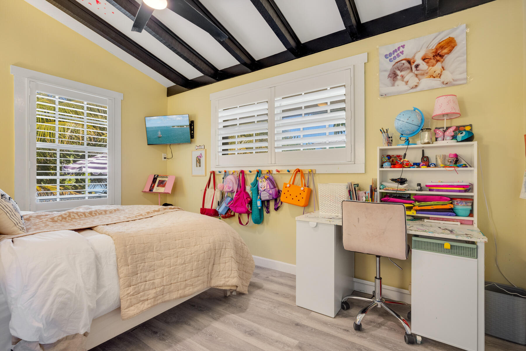 29961 Pine Channel Road Big Pine Key, FL 33043 - Photo 17 of 32 a bedroom with a bed and a window