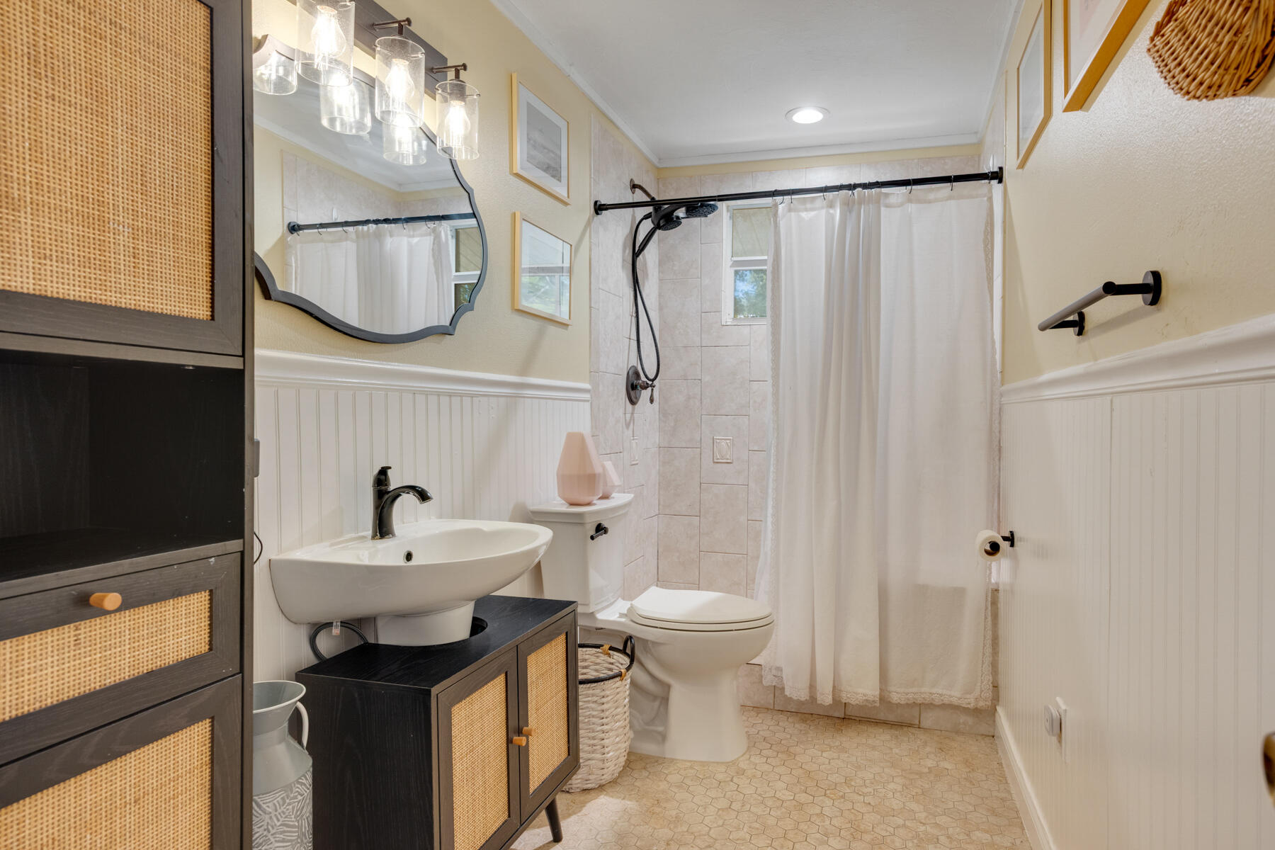 29961 Pine Channel Road Big Pine Key, FL 33043 - Photo 18 of 32 a bathroom with a sink a toilet and a mirror