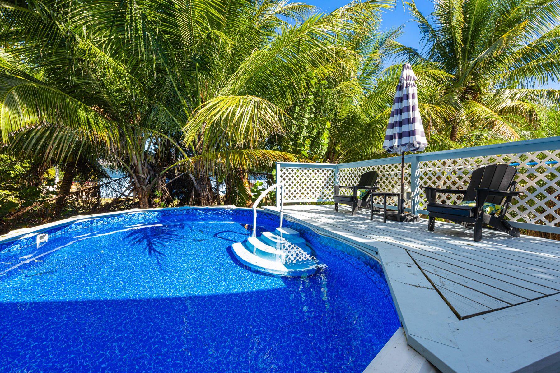 29961 Pine Channel Road Big Pine Key, FL 33043 - Photo 21 of 32 a view of a chairs and table in patio