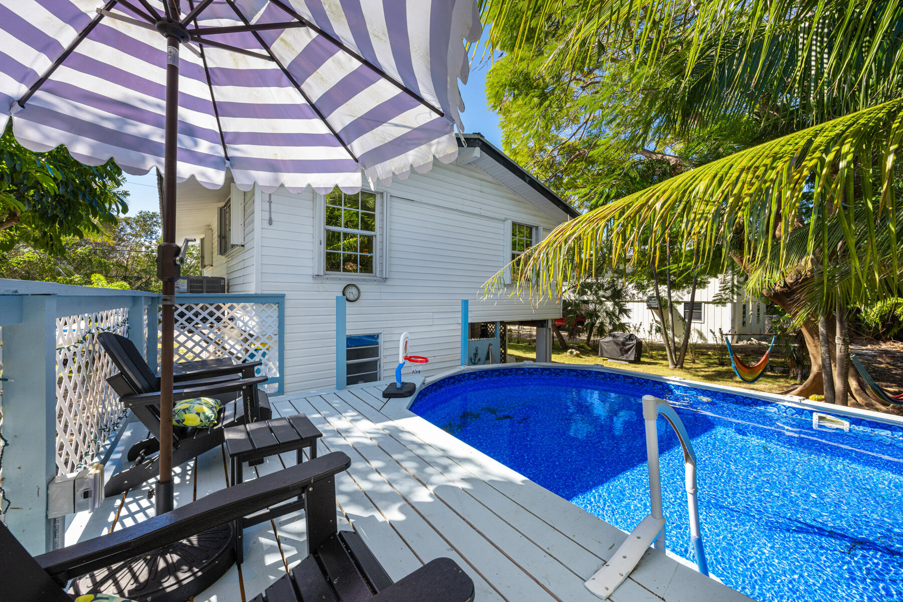 29961 Pine Channel Road Big Pine Key, FL 33043 - Photo 22 of 32 a view of outdoor seating and fire pit