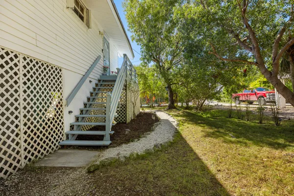 a balcony with wooden floor
