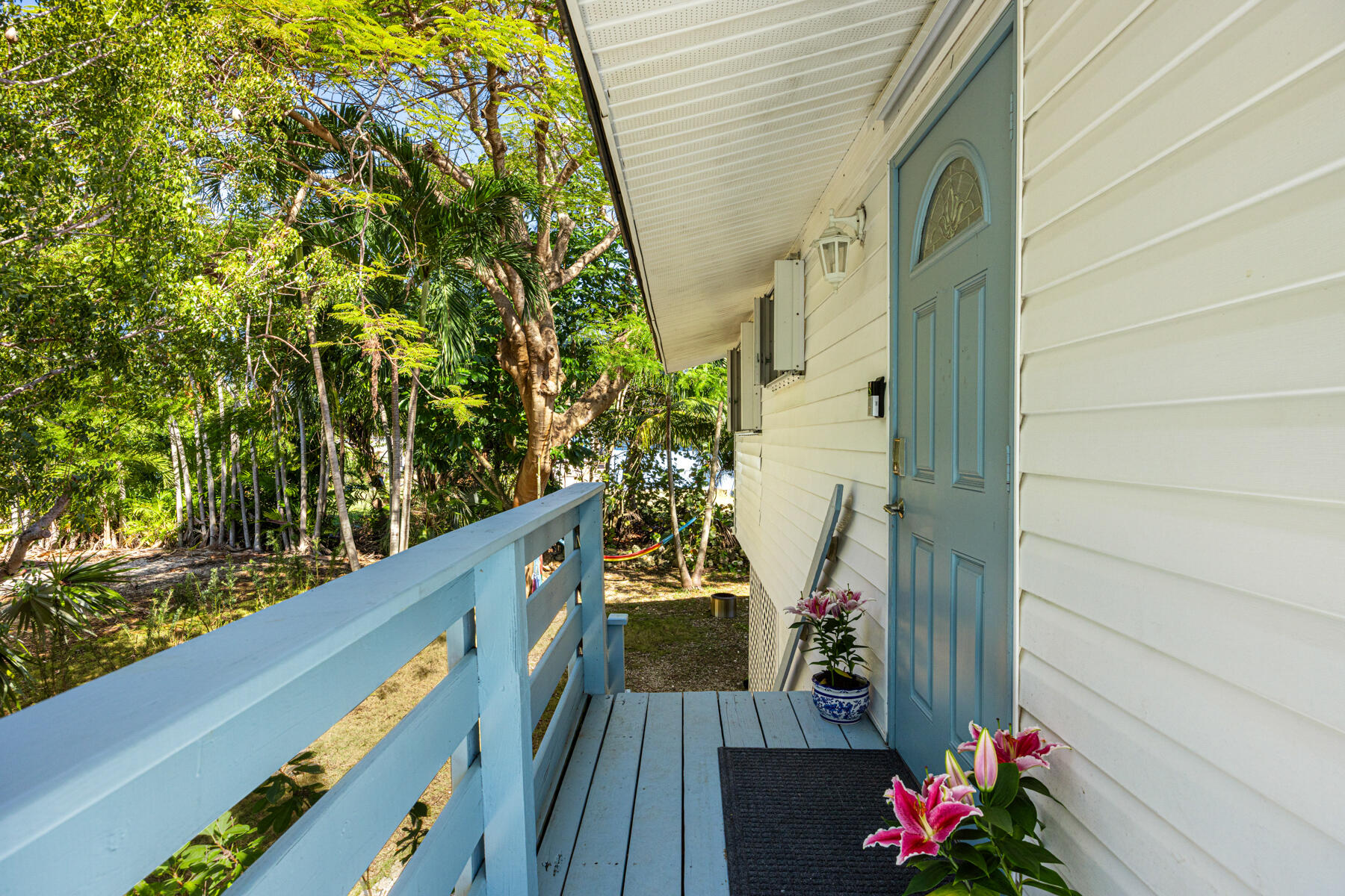 29961 Pine Channel Road Big Pine Key, FL 33043 - Photo 5 of 32 a balcony with wooden floor