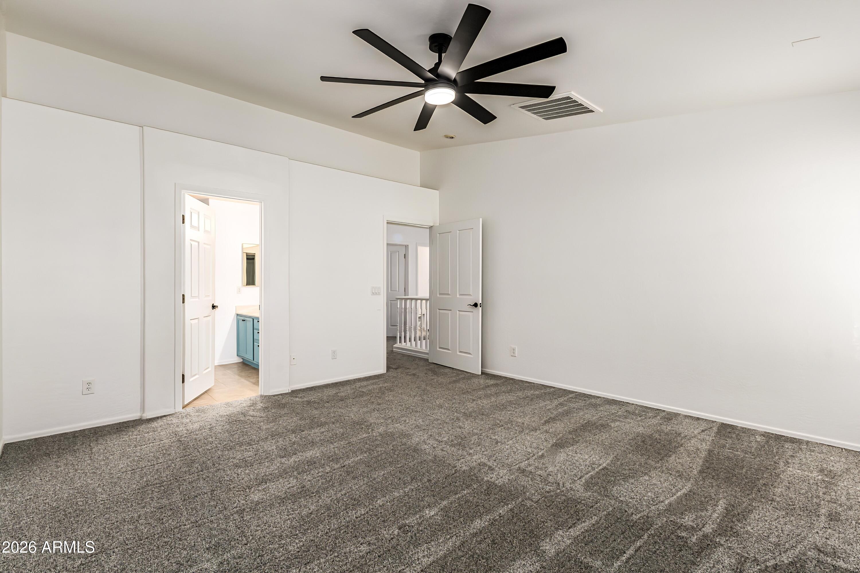 4208 South Sawmill Road Gilbert, AZ 85297 - Photo 18 of 46 wooden floor in an empty room