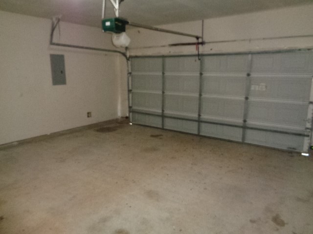 205 Maple Lane Conroe, TX 77304 - Photo 17 of 19 a view of a room with racks on the wall