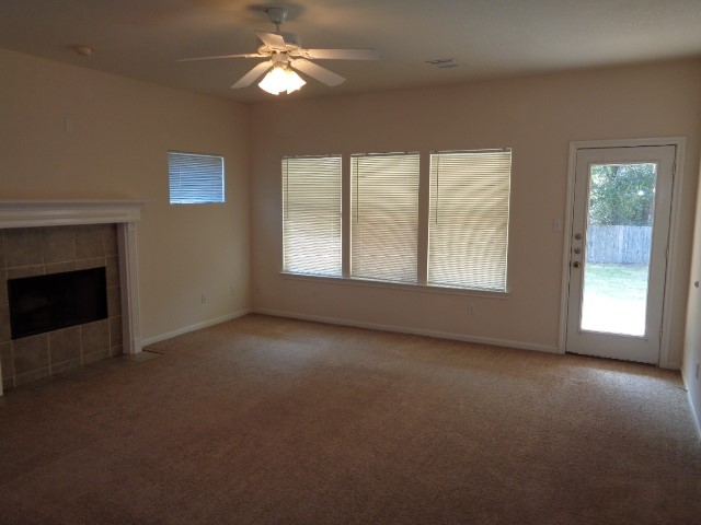 205 Maple Lane Conroe, TX 77304 - Photo 2 of 19 a view of empty room with window