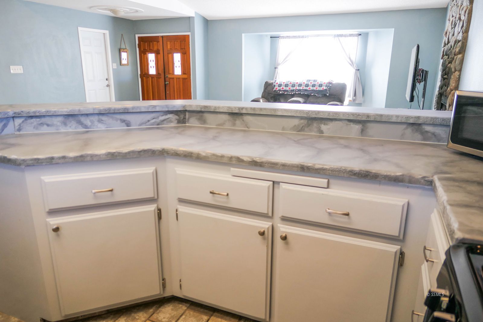 601 Heather Court Ridgecrest, CA 93555 - Photo 17 of 45 a view of a sink and a mirror