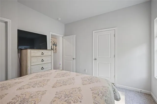 an empty room with closet area