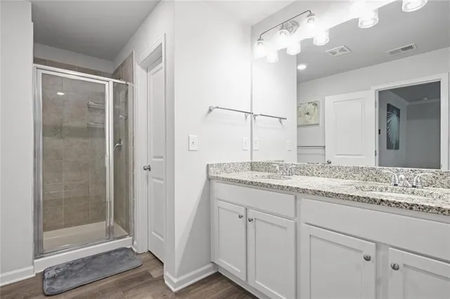 a bathroom with sink and mirror