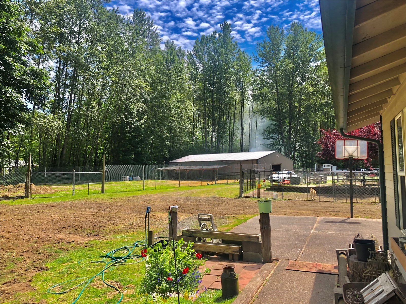 144 Morgan Road Toutle, WA 98649 - Photo 12 of 40 a view of a swimming pool with a patio and a yard