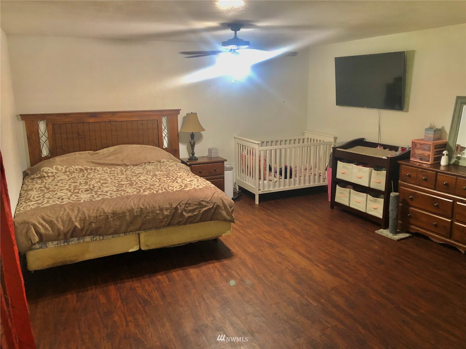 144 Morgan Road Toutle, WA 98649 - Photo 24 of 40 a bedroom with a bed and a flat screen tv