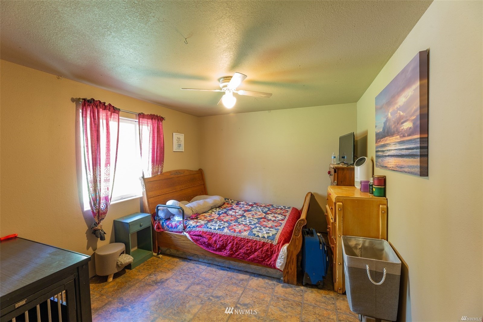 144 Morgan Road Toutle, WA 98649 - Photo 30 of 40 a bedroom with a bed and wooden floor